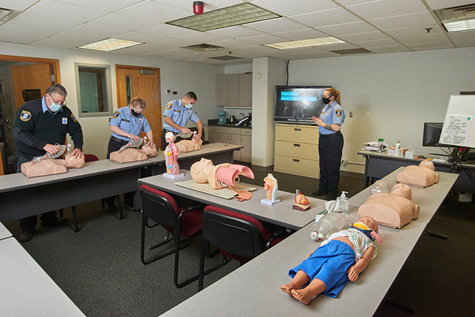 First responders practicing on mannequins